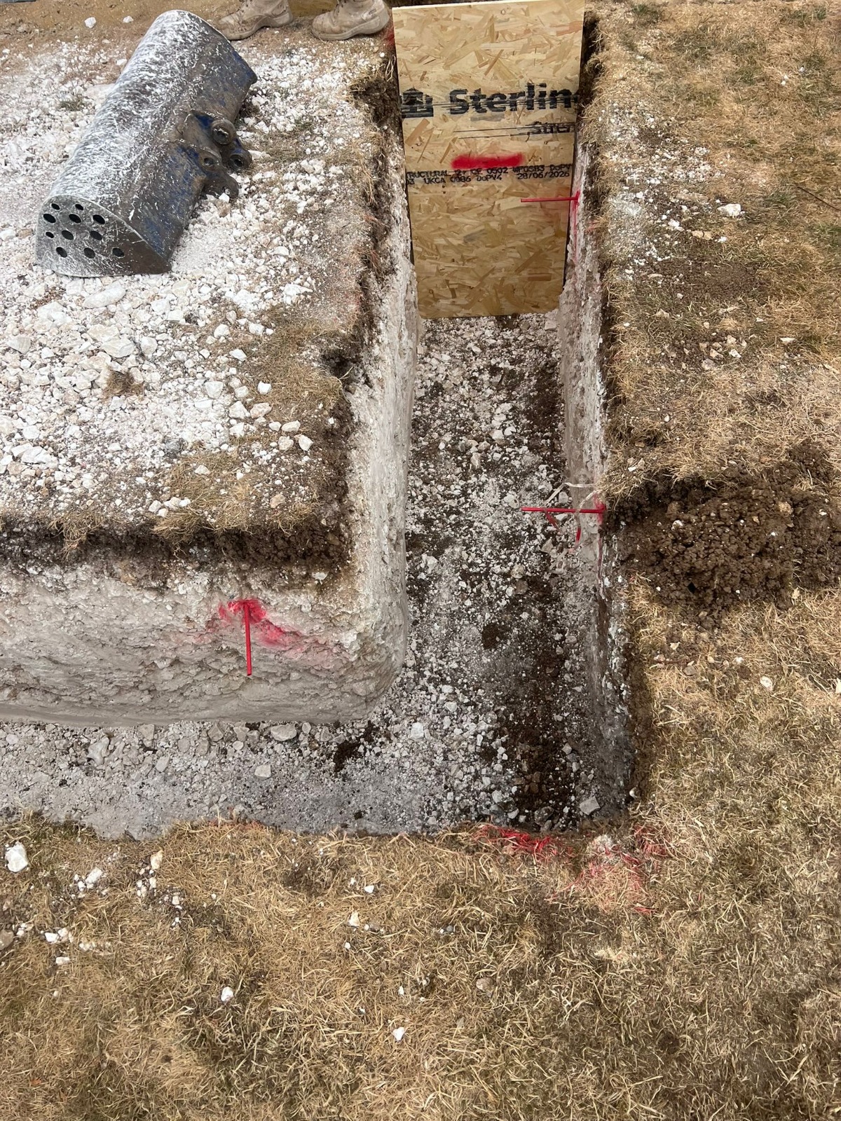 Foundation trench dug out with level pegs