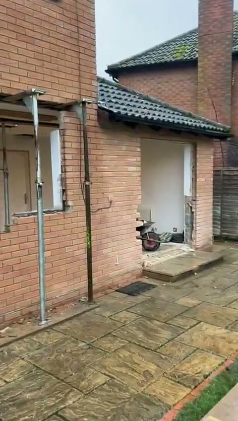 Video of a rear wall opened up and propped for a new steel