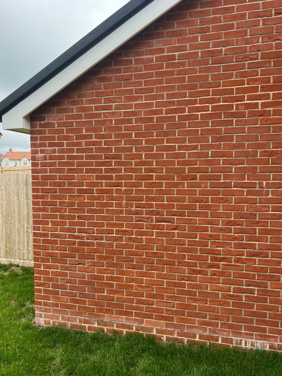 Red brick gable end with neat pointing